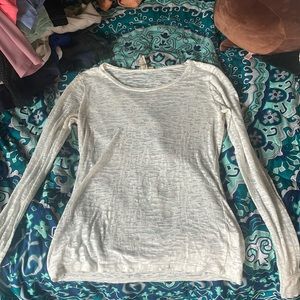 Long sleeve shirt, kinda sheer but really good for like a styled under shirt!
